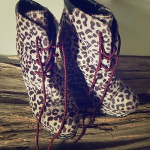 Animal print high heeled workbook style boots